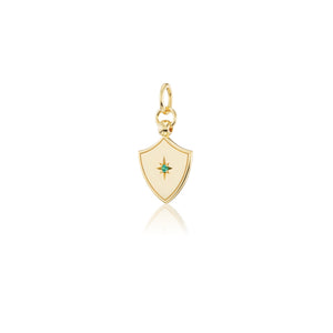 14k gold shield shaped charm with a star set gemstone in the middle