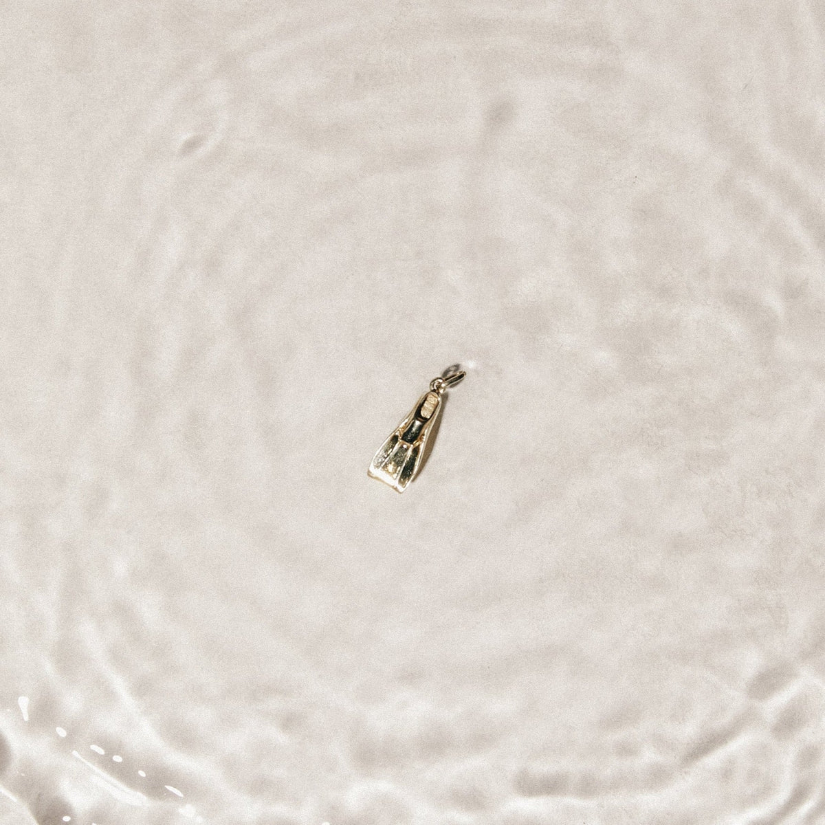 vintage gold flipper charm 