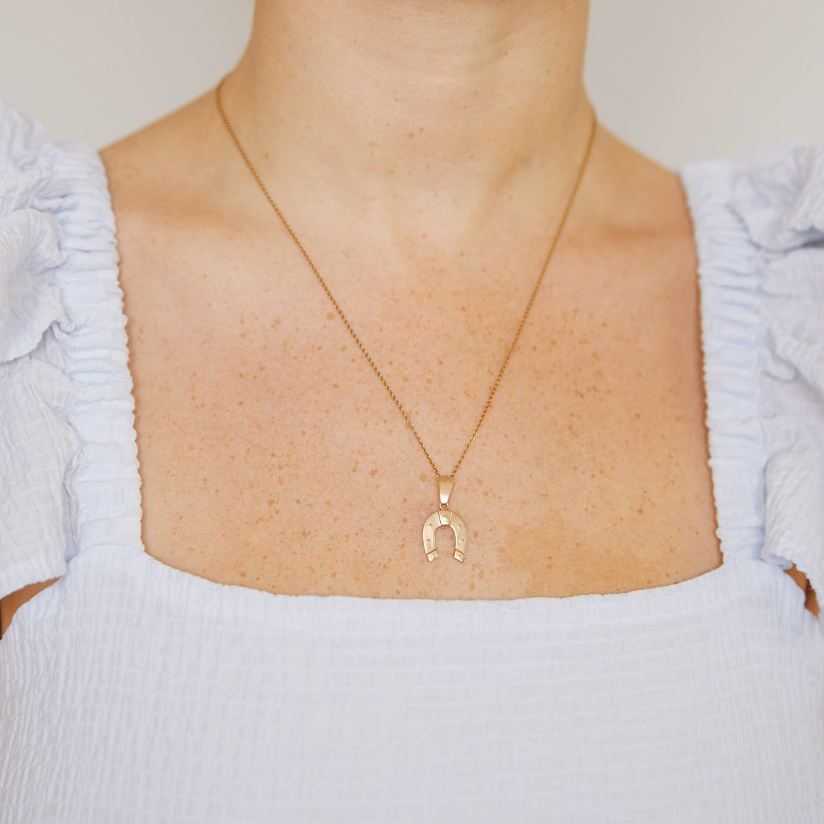 Vintage 14k Horseshoe Charm by Fewer Finer