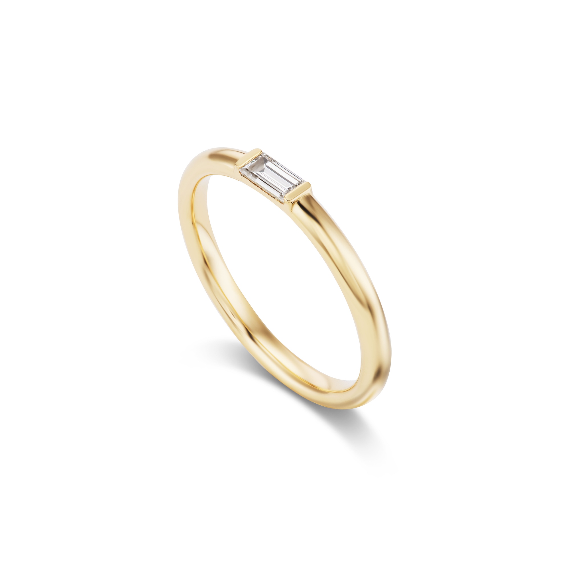 Rounded 14k gold band with a petite baguette diamond