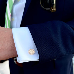 Model wearing 14k solid gold cufflinks with hand engraved monogram